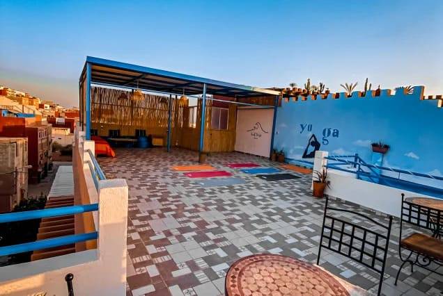 Private ensuite room with a double bed and a balcony overlooking Tamraght, Morocco – photo 4