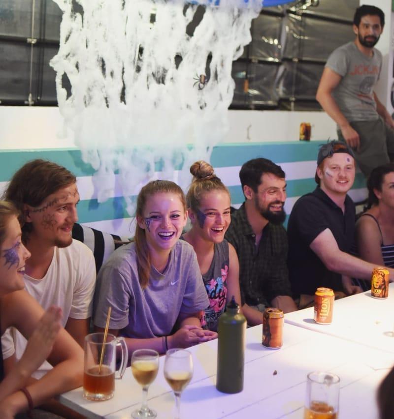 Guests at a camp party night at The Surfer Beach Camp, Weligama, Sri Lanka