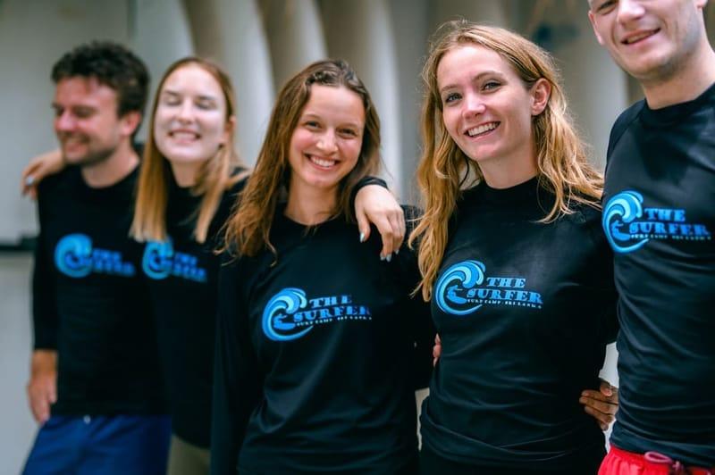Guests wearing The Surfer surf camp t-shirts at the camp in Weligama, Sri Lanka